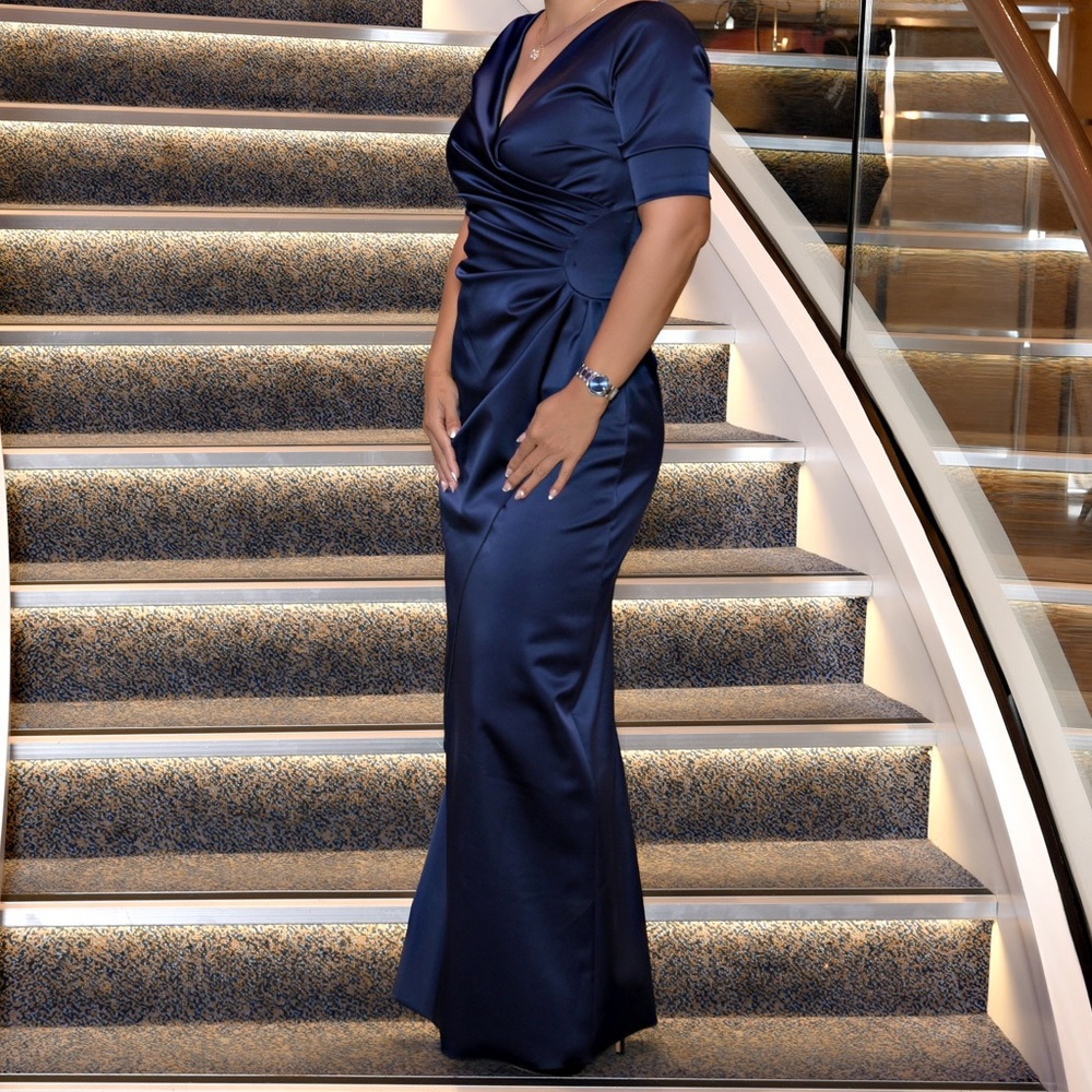 Beautiful navy blue.  Bought this at Newman Marcus.  Wore it one time only.